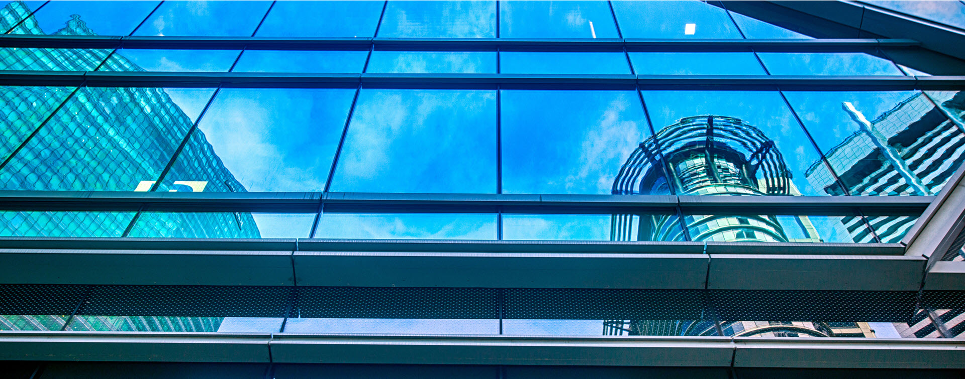 Looking up at buildings and the sky