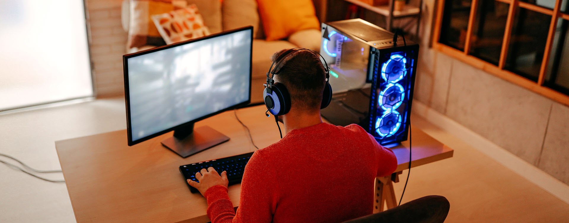 Person gaming on desktop computer