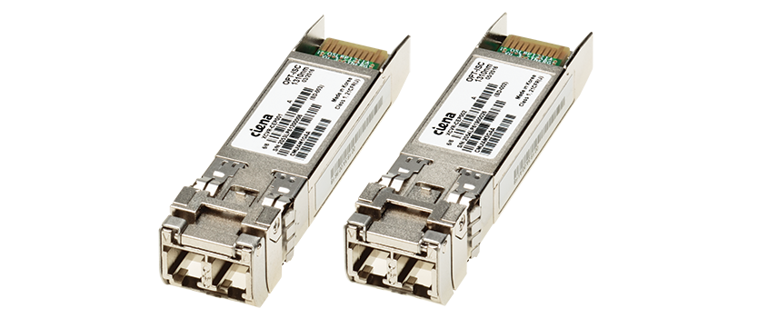 Two Ciena optical transceivers with metallic casings, fiber optic connectors, and labeled with product information.